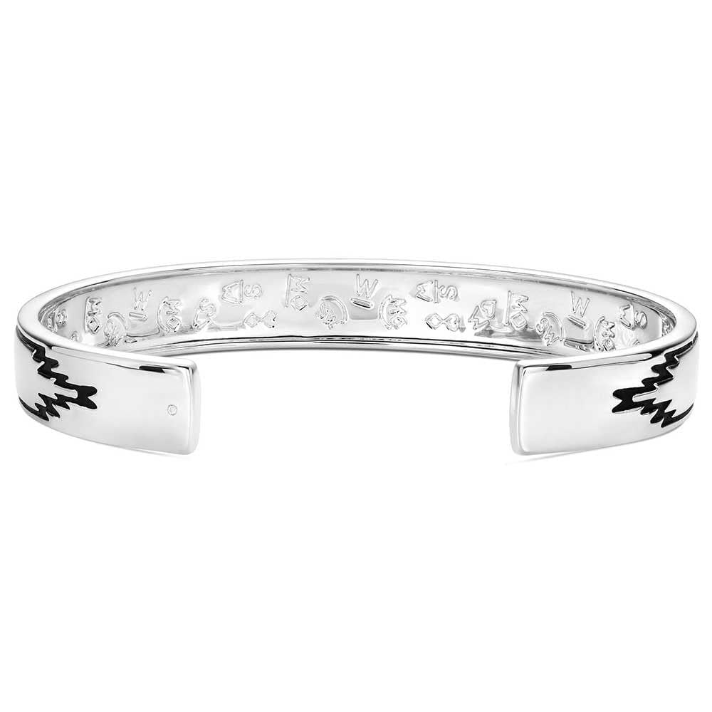 
                  
                    Silver bracelet with engraved design on a white background
                  
                