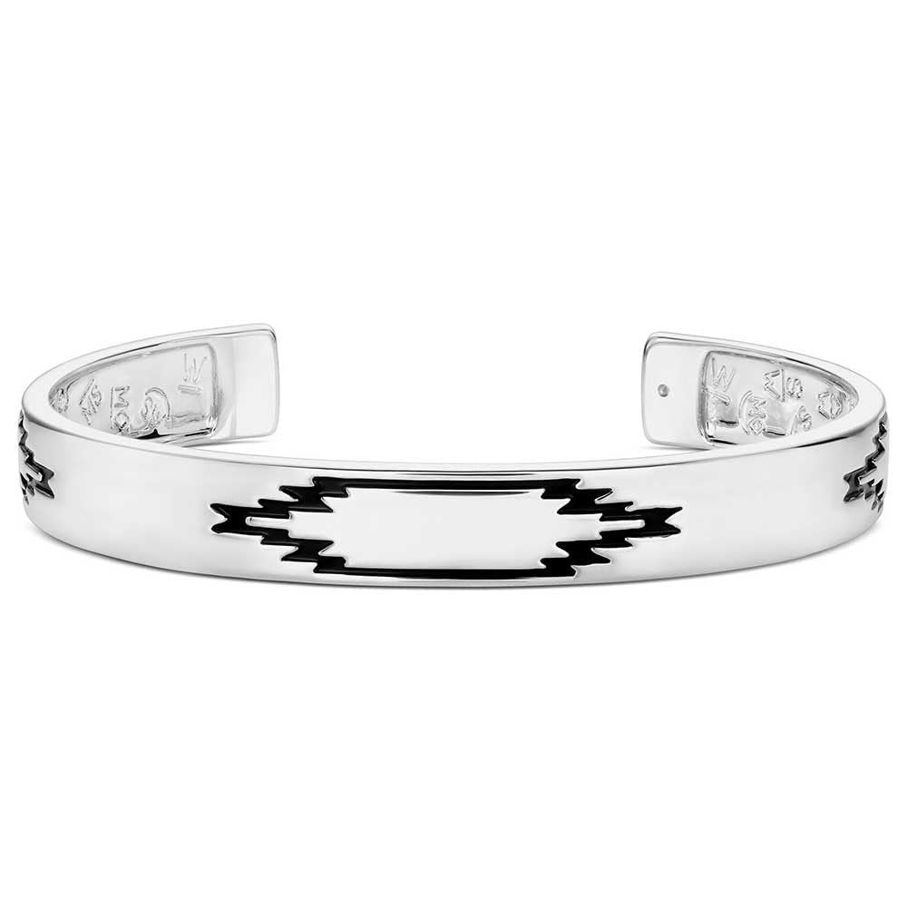 Silver bracelet with black geometric pattern on a white background