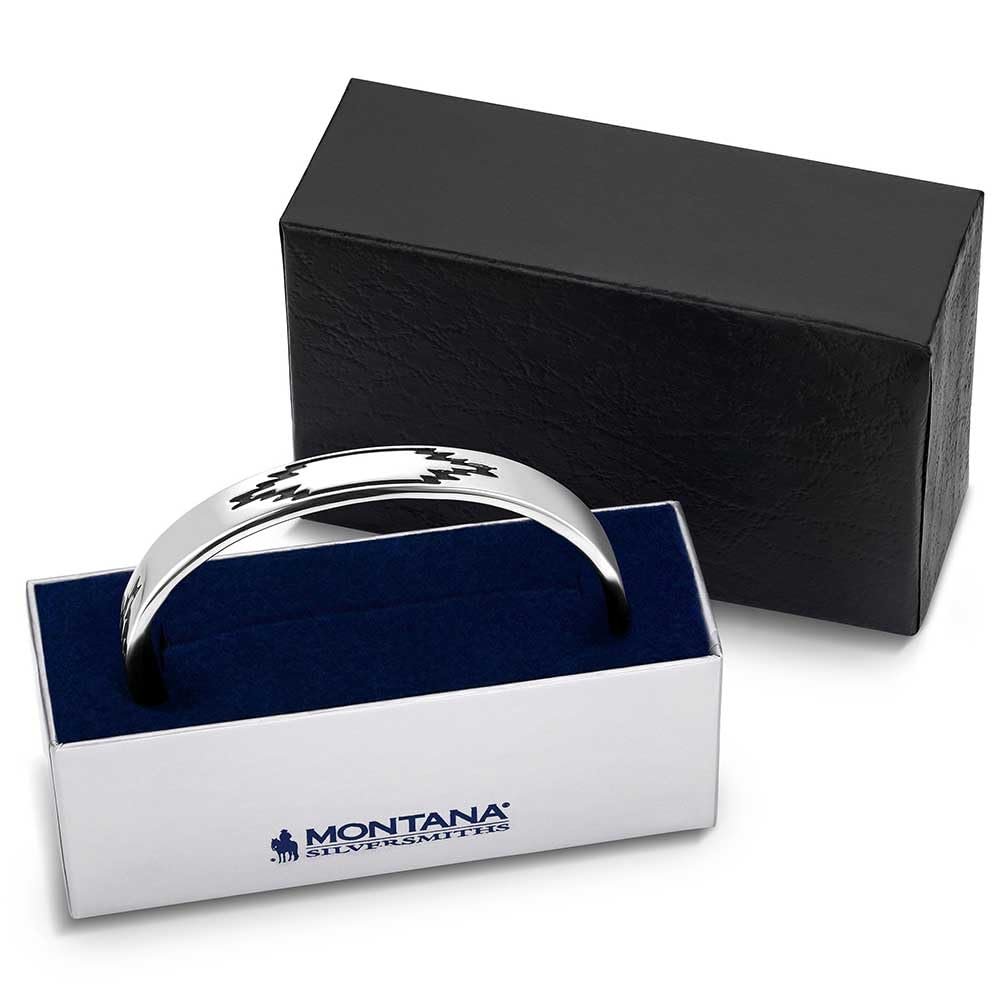 
                  
                    Silver bracelet in a Montana Silversmiths box with a black background
                  
                