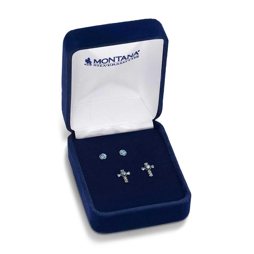 
                  
                    Blue jewelry box with earrings on a white background
                  
                