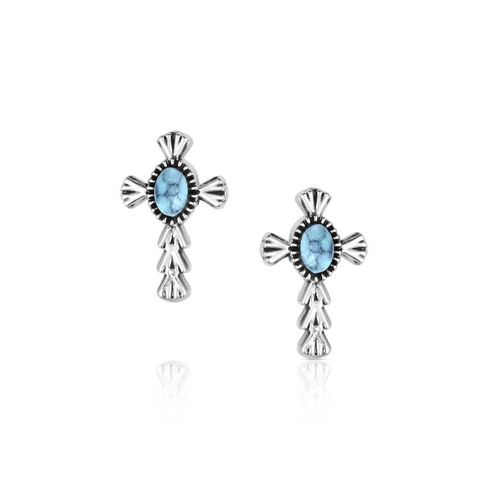 
                  
                    Silver cross-shaped earrings with blue gemstones on a white background
                  
                