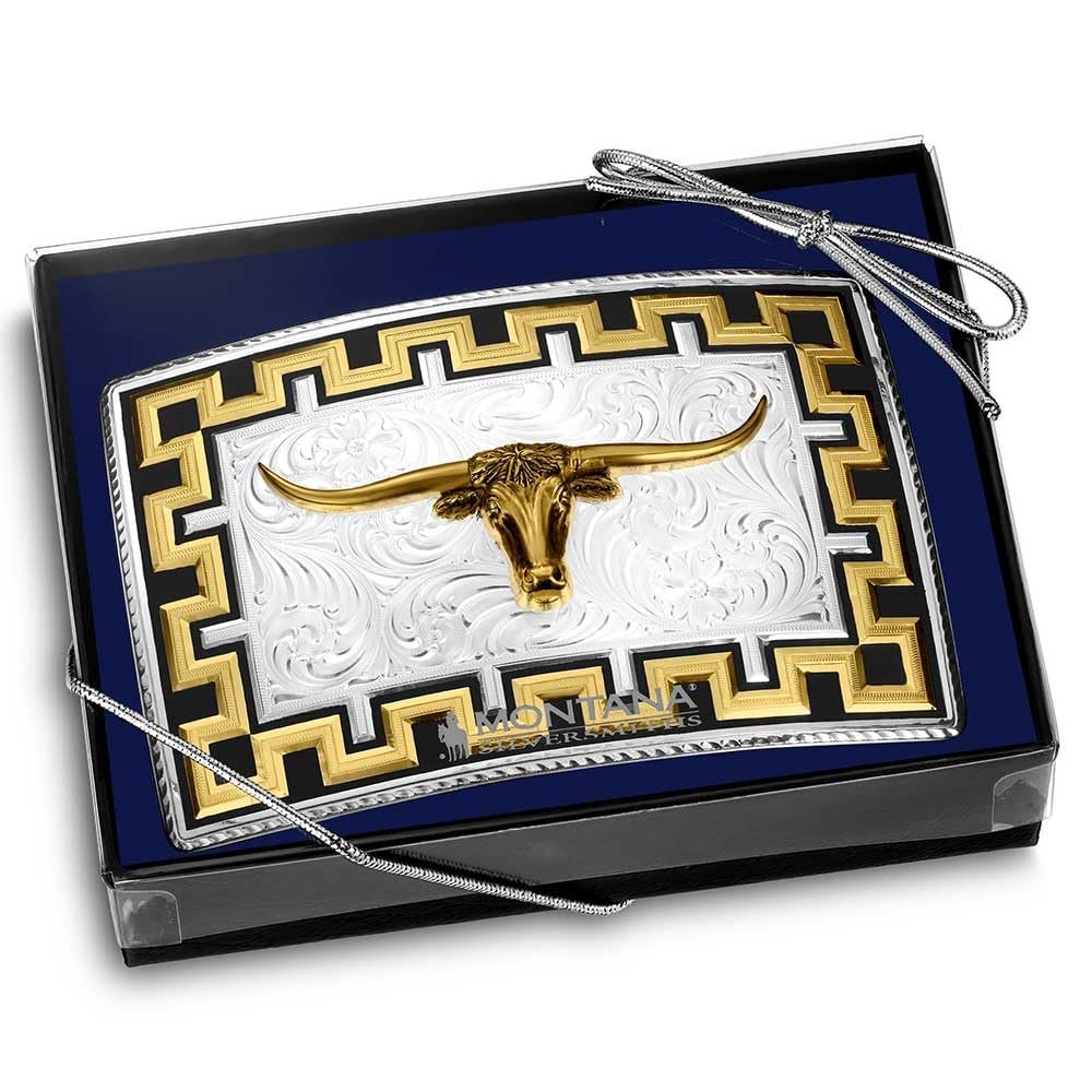 Gold longhorn bull necklace in a decorative box with 'Montana' branding.