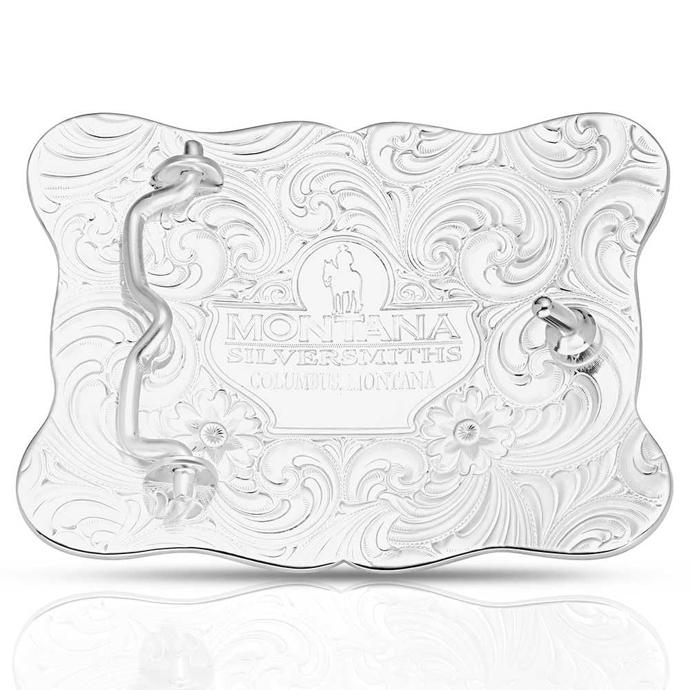 Decorative silver tray with intricate designs and 'Montana Silversmiths' branding on a white background.