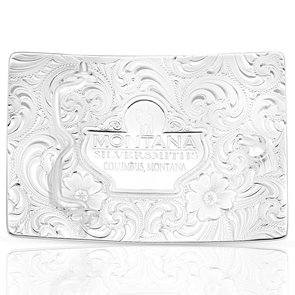 Silver jewelry box with intricate patterns and 'Montana Silversmiths' branding on a white background