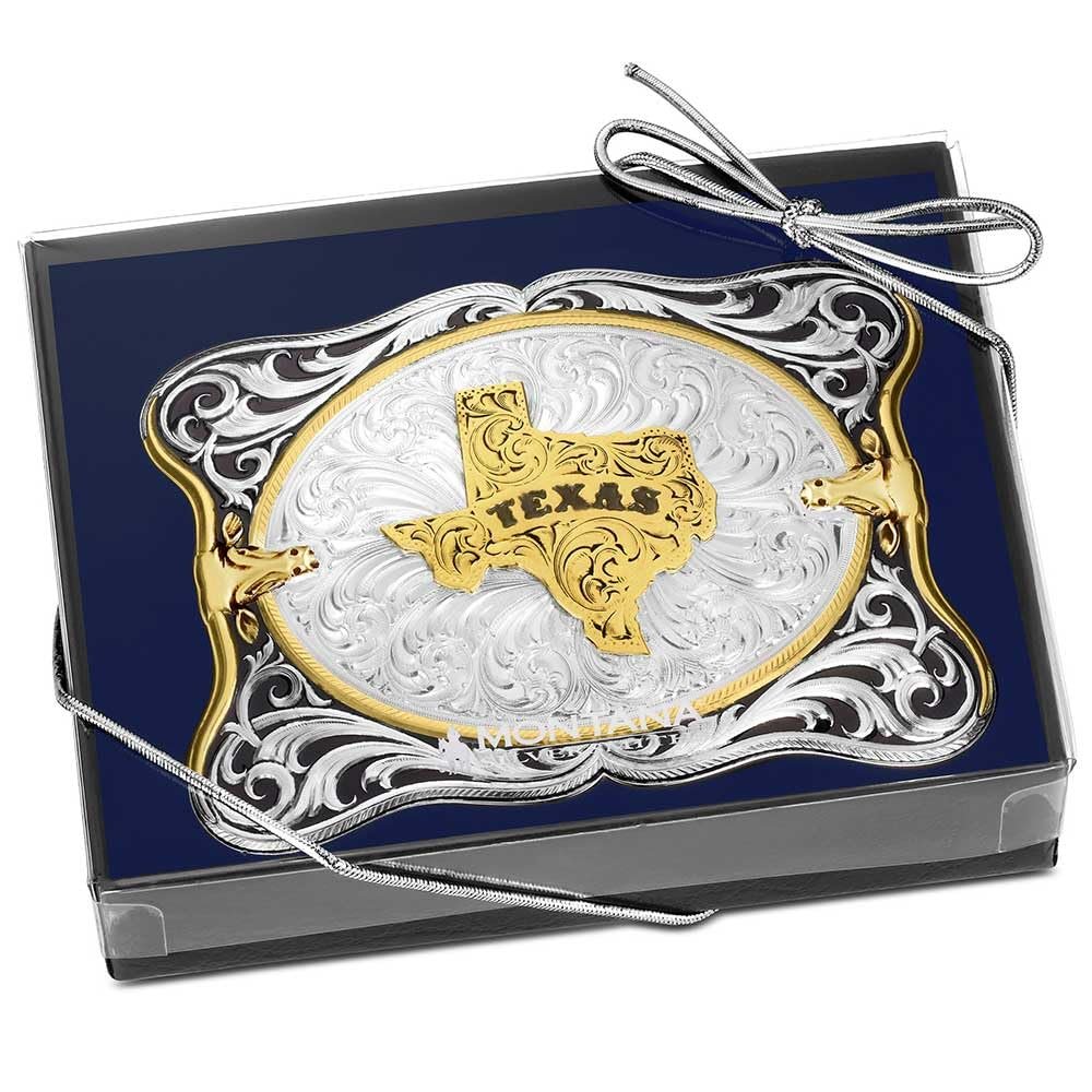 Decorative belt buckle with 'Texas' design on a blue background