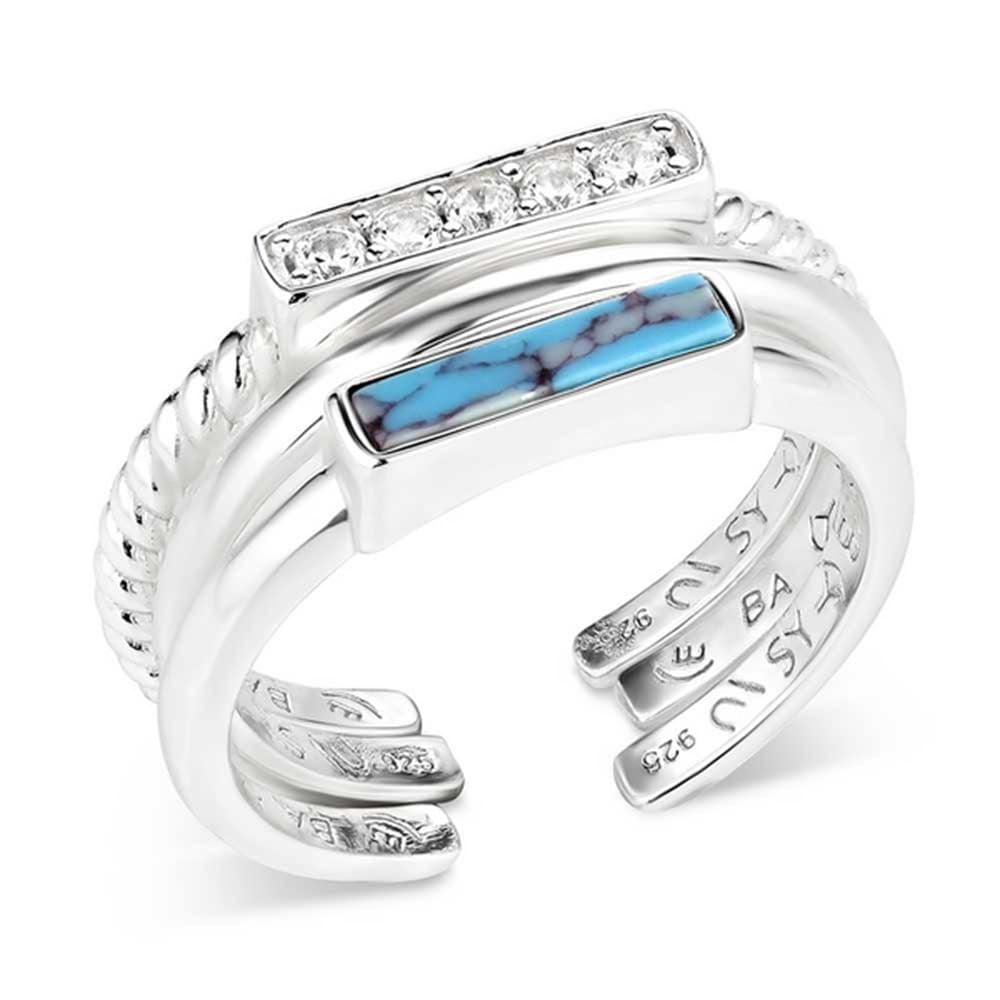 Silver ring with turquoise stone and diamond accents on a white background