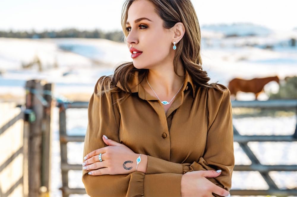 
                  
                    Woman wearing a brown blouse with a blurred outdoor background
                  
                