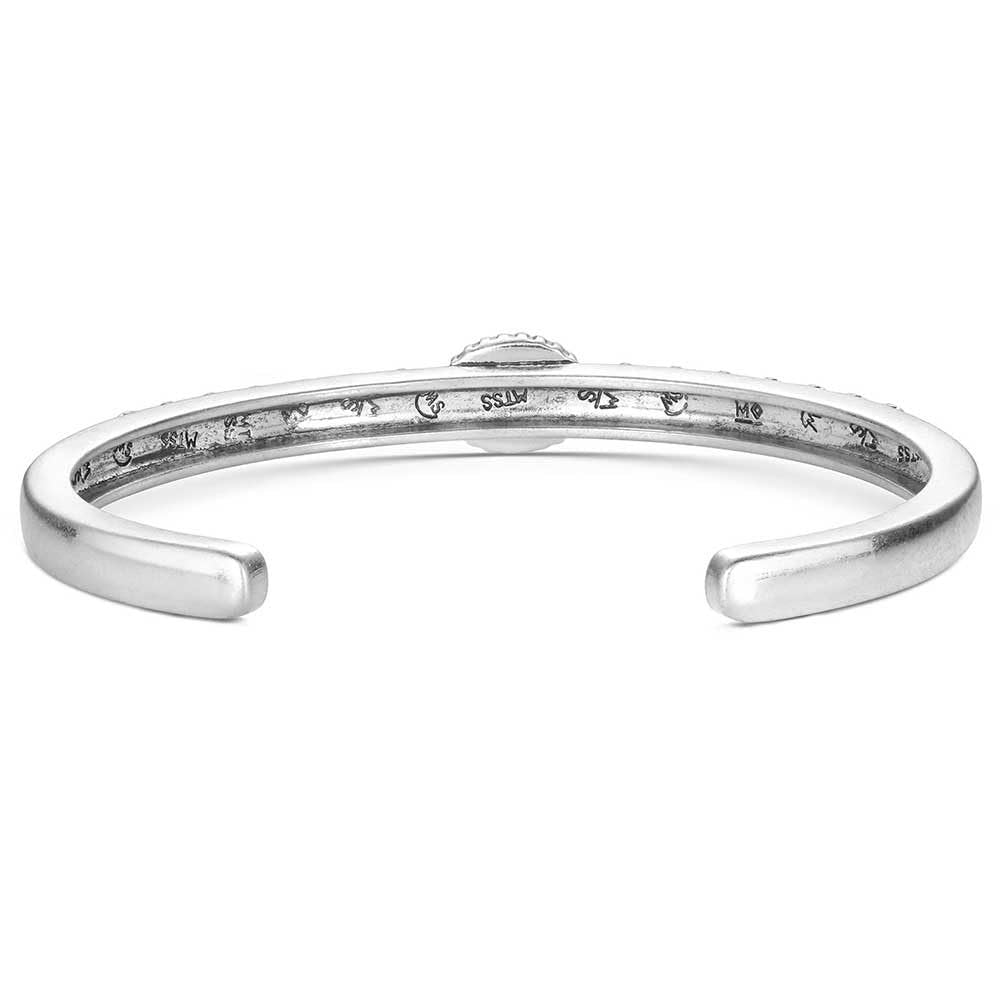 
                  
                    Silver bracelet with engraved text on a white background
                  
                