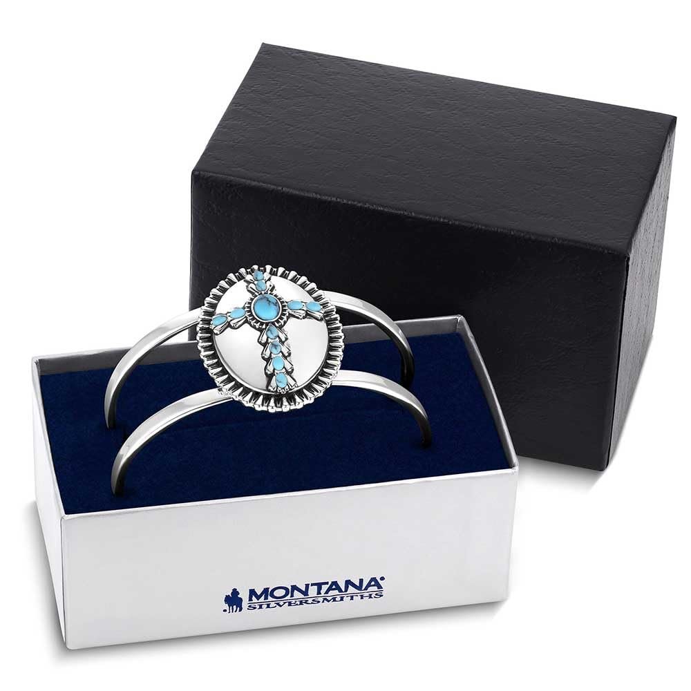 
                  
                    Silver bracelet with turquoise stones in a Montana Silversmiths box
                  
                