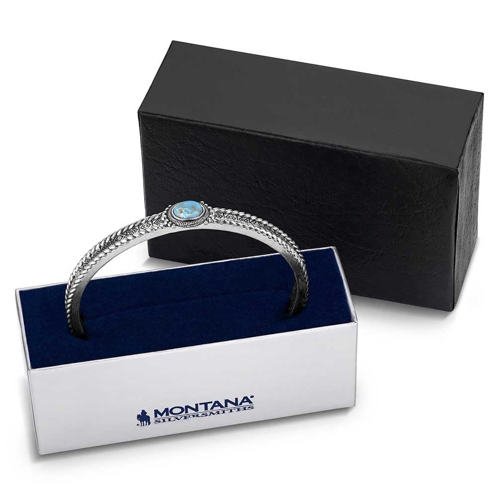 Silver bracelet with turquoise stone in a Montana Silversmiths box