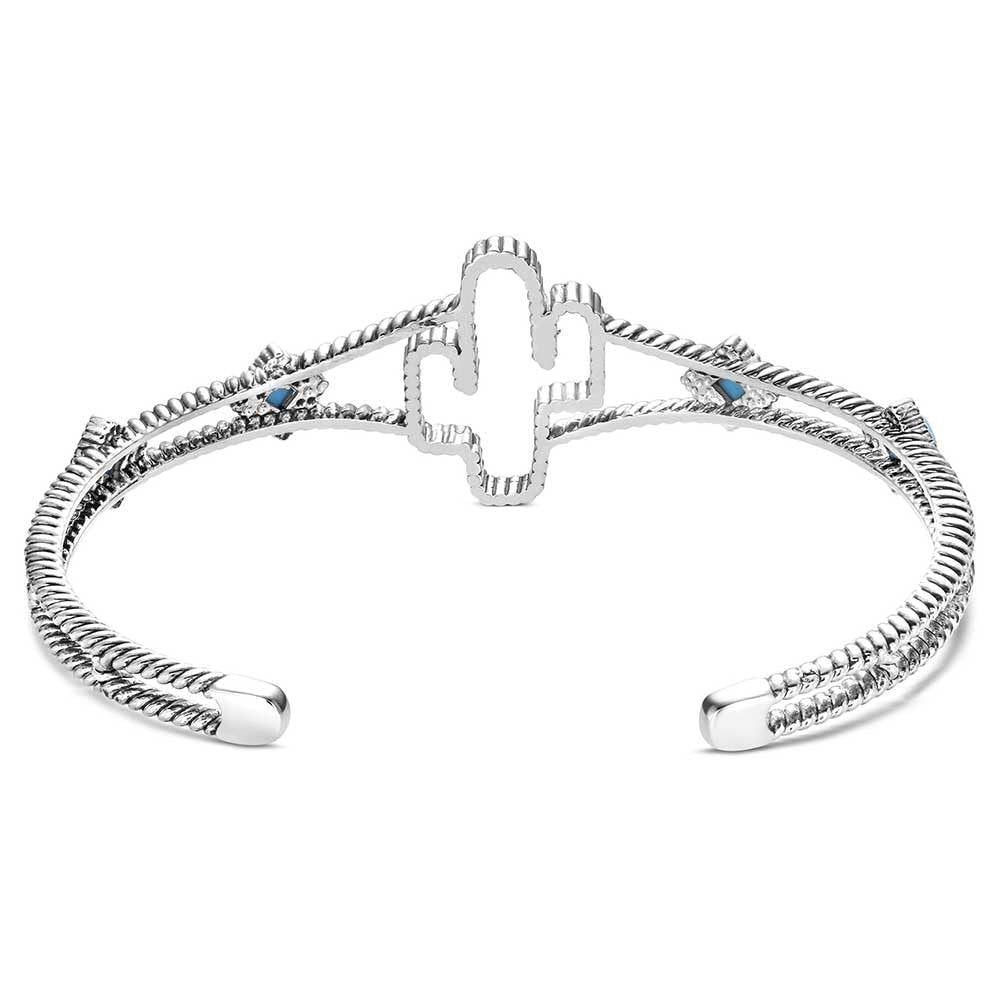 Silver bracelet with cactus design on a white background