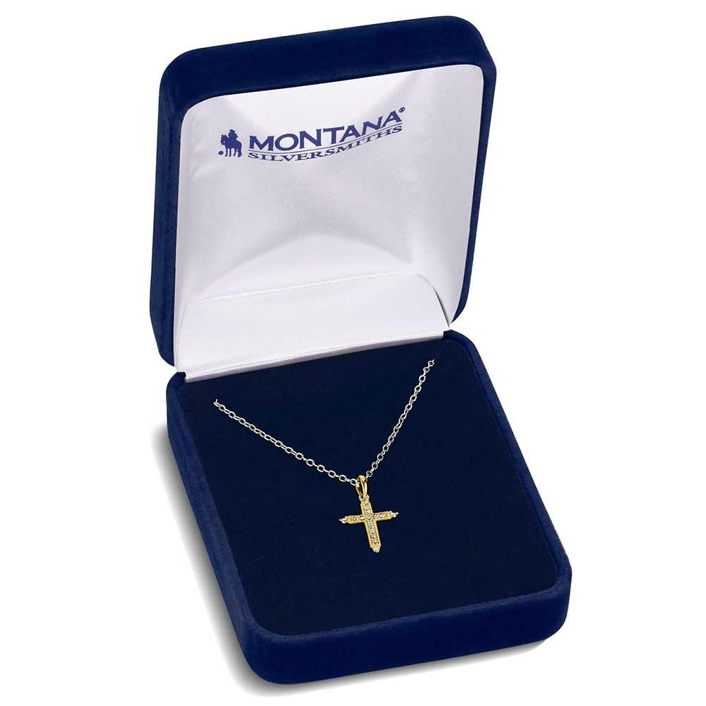
                  
                    Gold cross necklace in a Montana Silversmiths box on a white background
                  
                