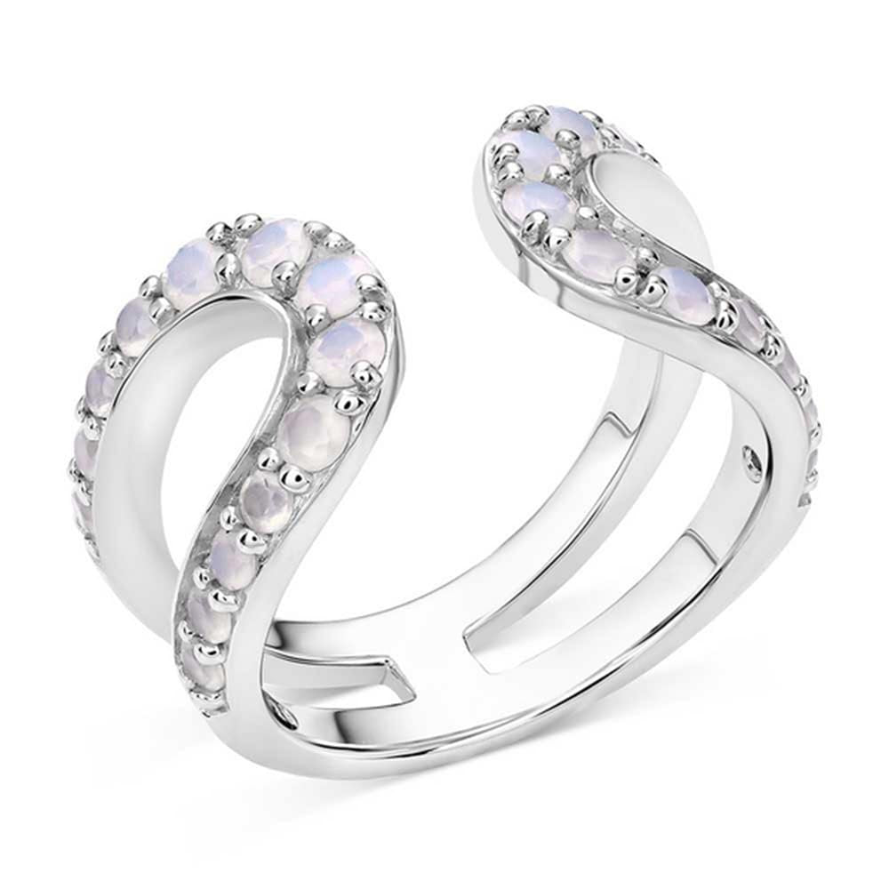 Silver ring with opal stones on a white background