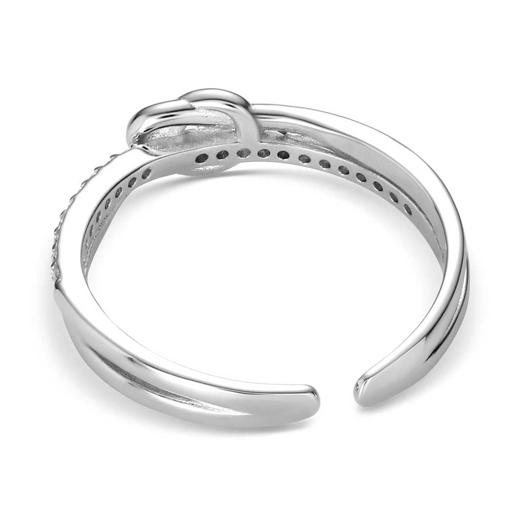 
                  
                    Silver ring with a unique design on a white background
                  
                
