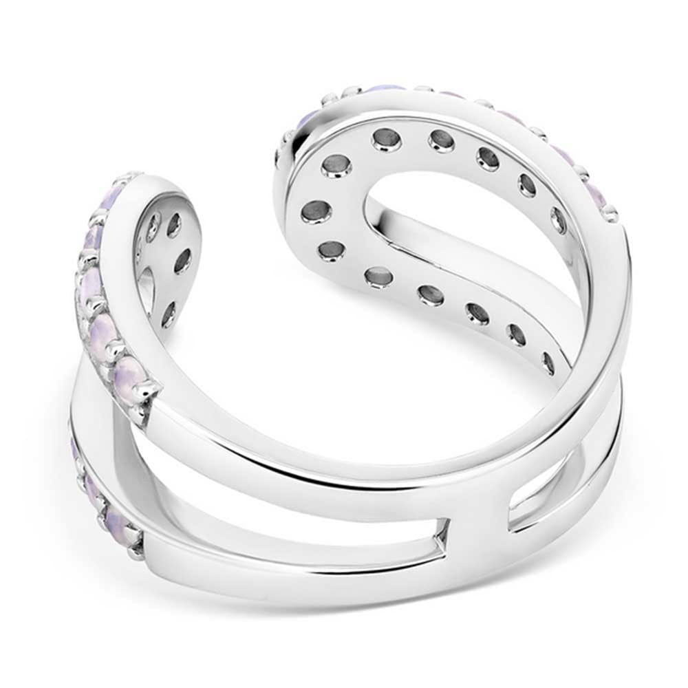 
                  
                    Silver ring with embedded stones on a white background
                  
                