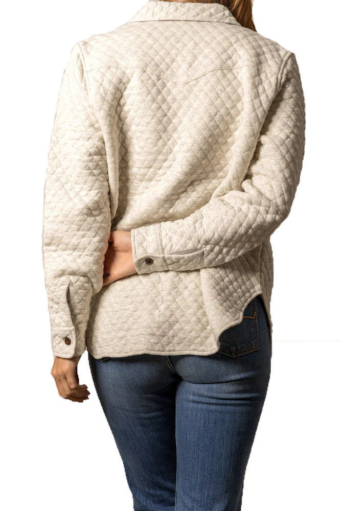 
                  
                    Person wearing a beige quilted jacket on a white background
                  
                