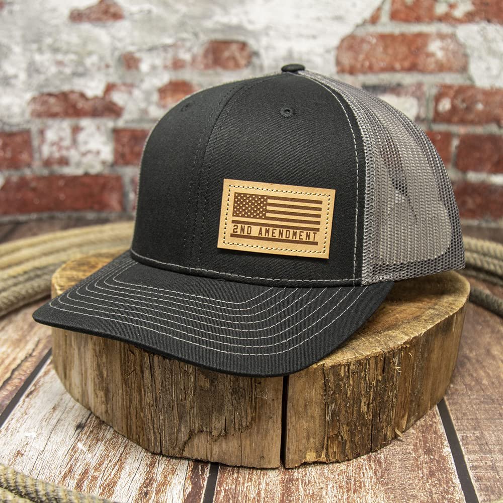 DALLY Up western cap featuring a 2nd Amendment leather patch, black front, charcoal mesh back, and adjustable snapback closure.