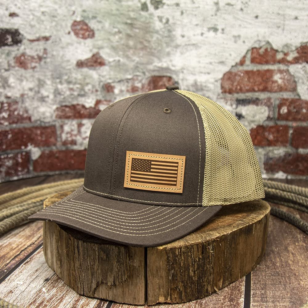 DALLY Up western cap featuring a premium American Flag leather patch, brown front, tan mesh back, and adjustable snapback closure.