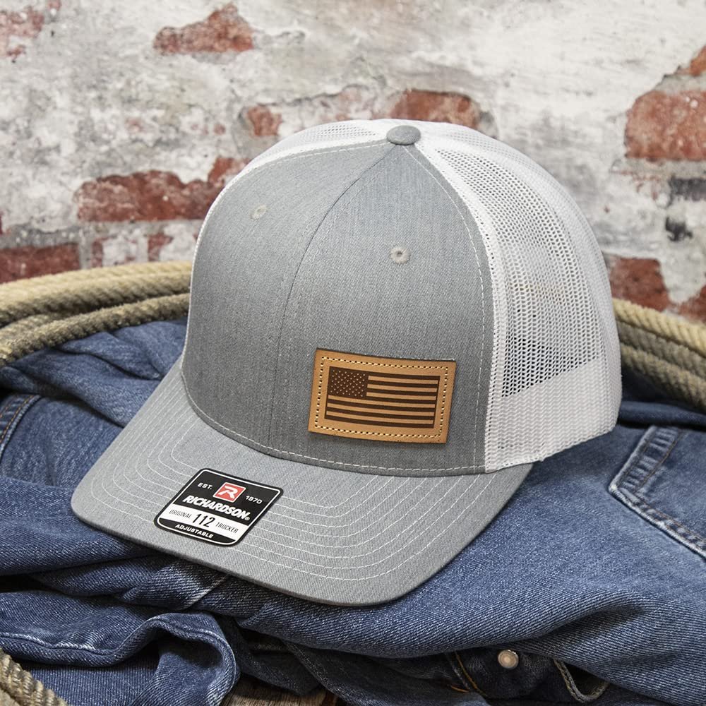 DALLY Up western cap featuring a premium American Flag leather patch, grey front, white mesh back, and adjustable snapback closure.
