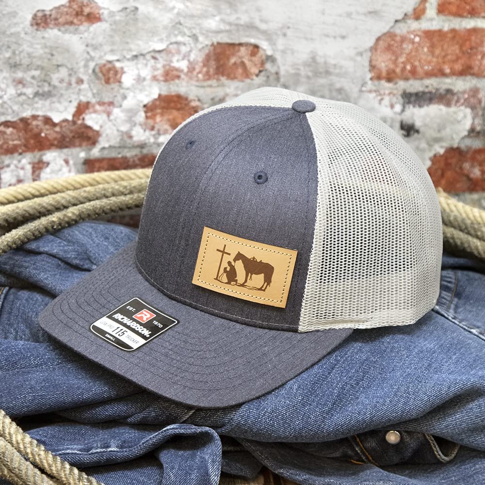 Navy and grey DALLY Up western Praying Cowboy adjustable snapback hat featuring a premium leather patch and curved bill.