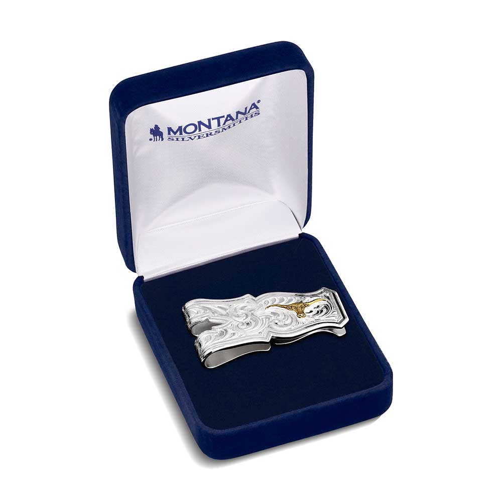 
                  
                    Montana Silversmiths Open Range Longhorn Money Clip displayed in a velvet gift box.
                  
                