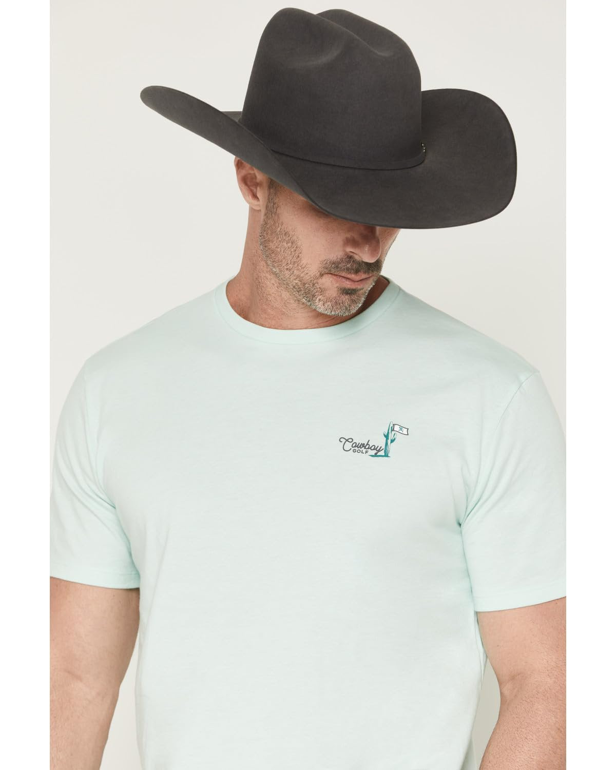 Man Wearing HOOEY Aqua Cowboy Golf Shirt on Golf Course