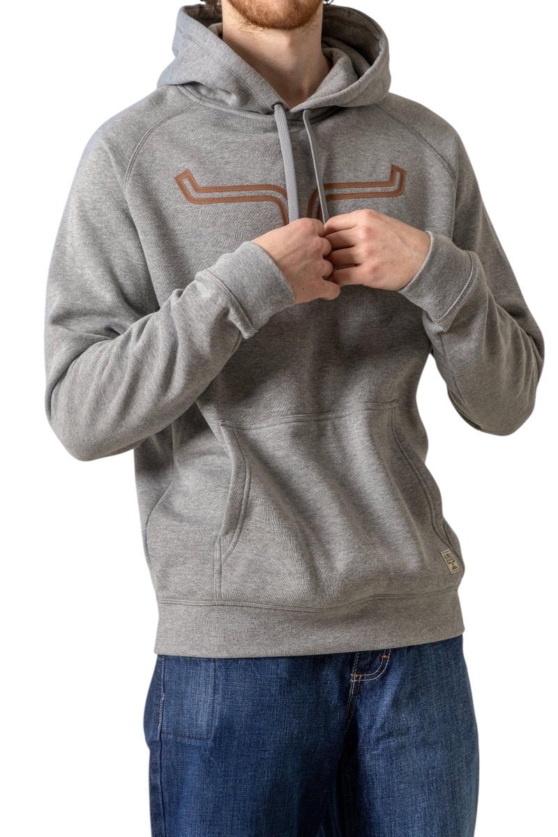 Angled view of Kimes Ranch Outlier Hoodie for men with soft fabric, drawstring hood, and western styling