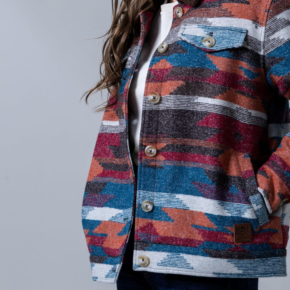 
                  
                    Close-up of Kimes Ranch Women's Red Rocks Jacket in Mid Blue
                  
                