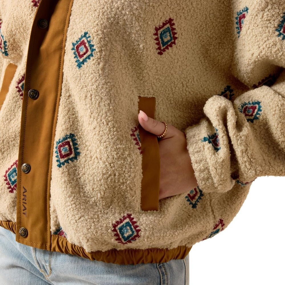
                  
                    Pocket of Ariat Women's Sherpa Blocked Jacket in Southwest Embroidered Motif
                  
                