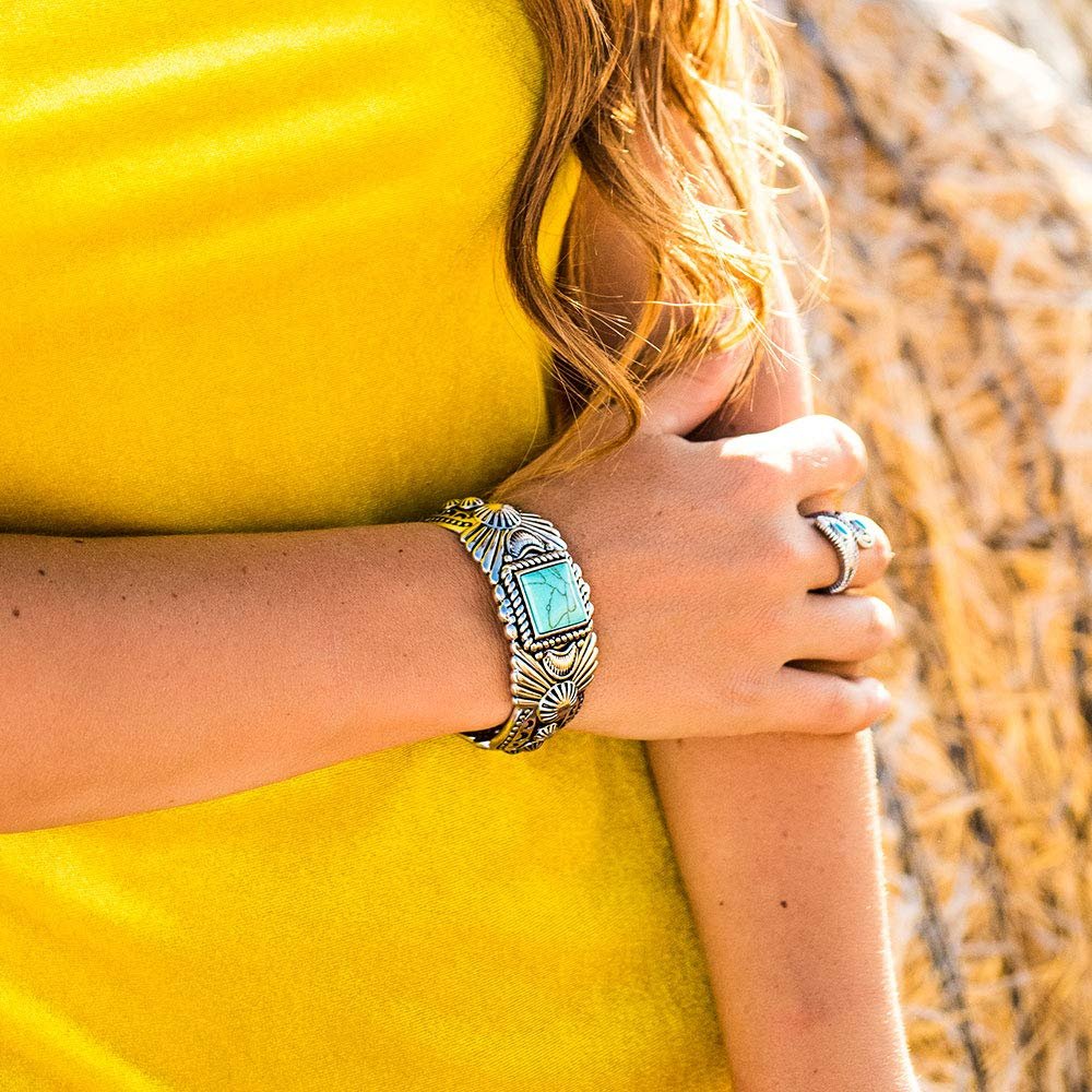 
                  
                    Woman Wearing Montana Silversmiths Women's Flourished Turquoise Cuff Bracelet
                  
                