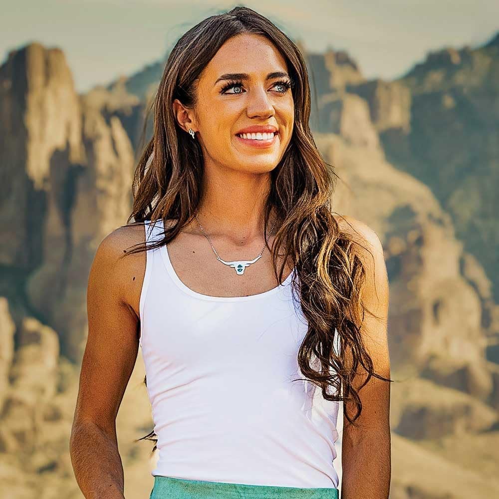 
                  
                    Woman Wearing Montana Silversmiths Women's Sparkling Saguaro Earrings
                  
                