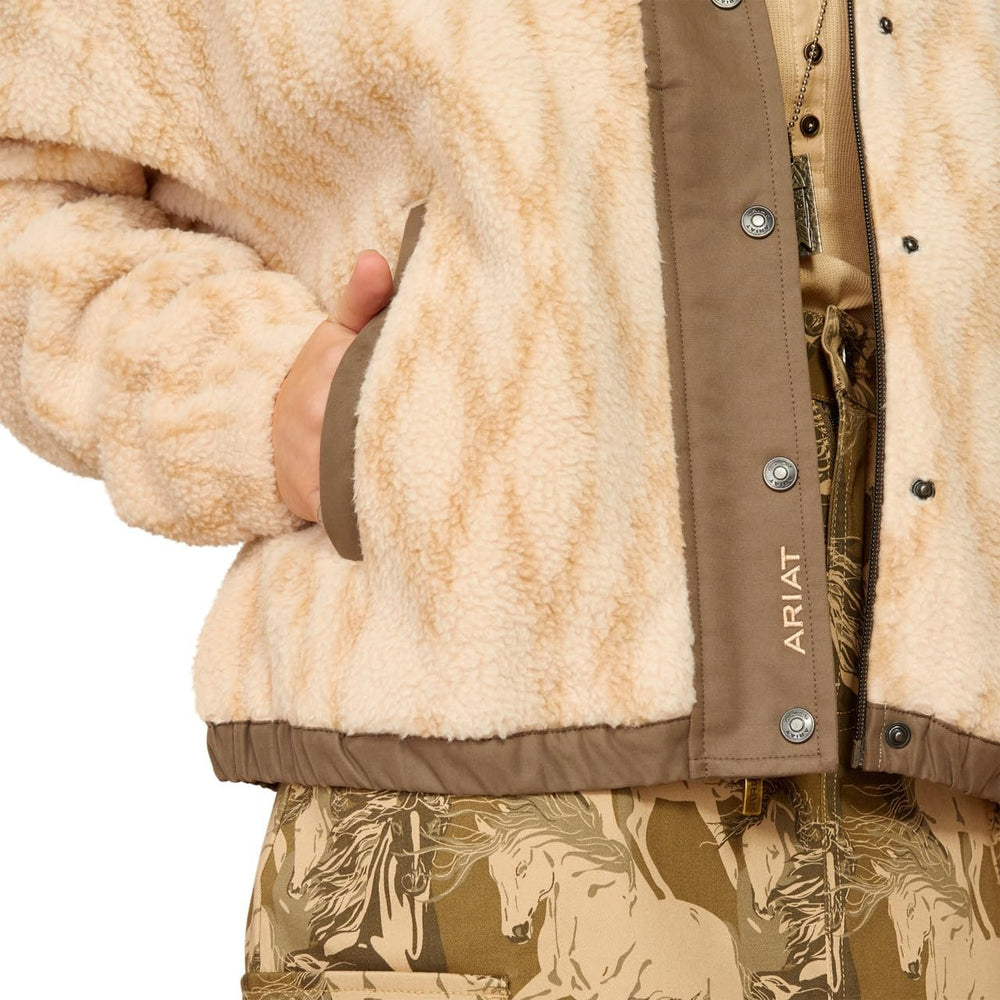 
                  
                    Close-up of Ariat Women's Sherpa Blocked Jacket in Tonal Sand Print
                  
                