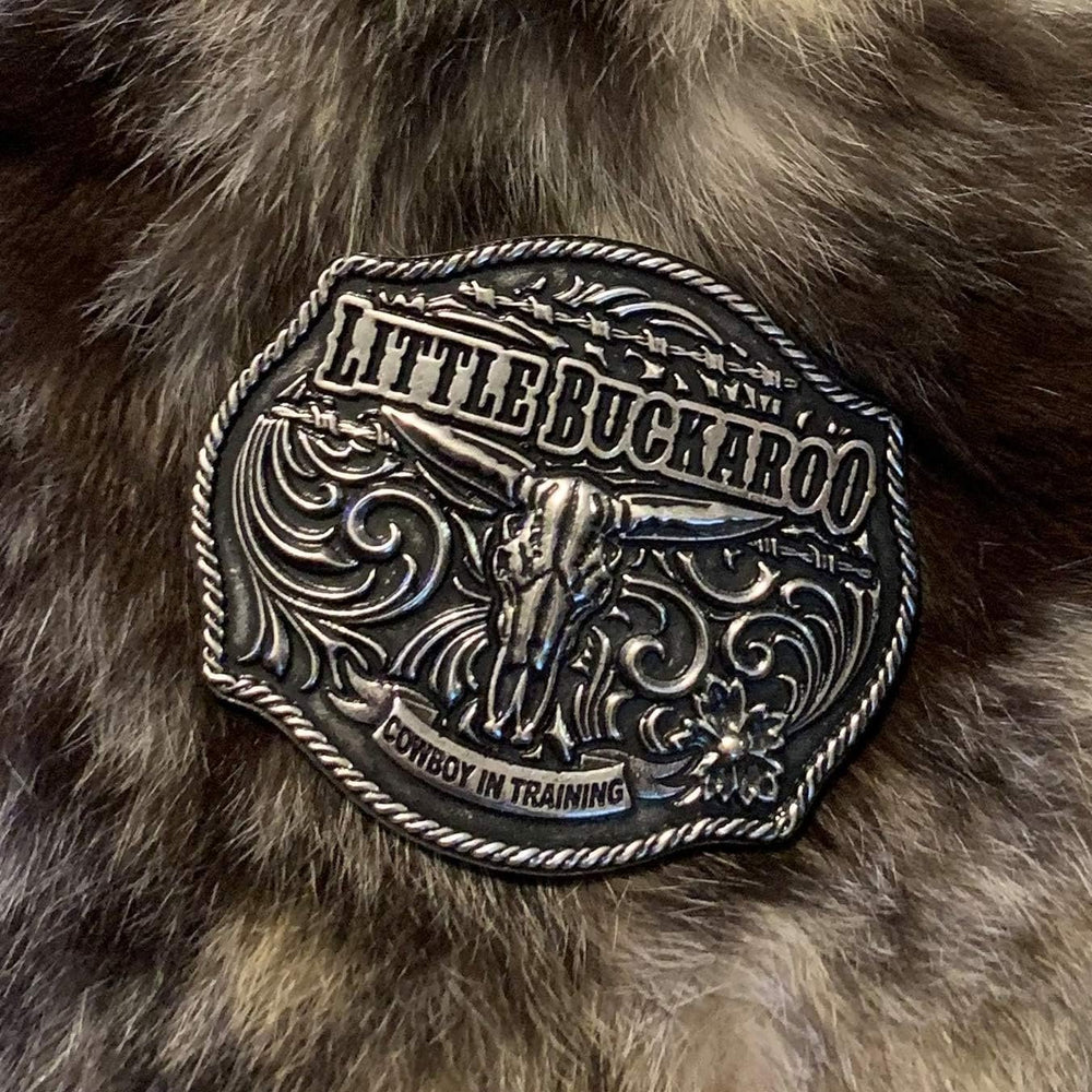 
                  
                    Montana Silversmiths Classic Impressions Lil Buckaroo Skull Kids Attitude Buckle Against Fur Background
                  
                