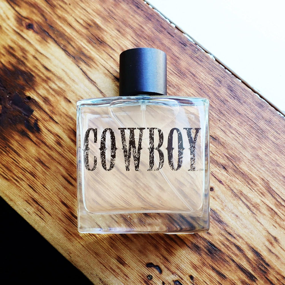 
                  
                    Tru Western Men's Cowboy Cologne Against Wooden Background
                  
                
