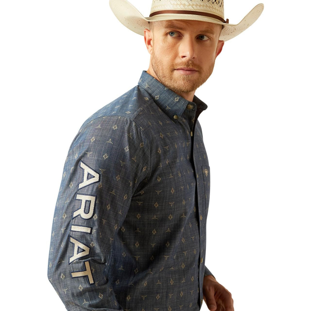 
                  
                    Ariat Logo on Sleeve of Ariat Men's Team Philibert Classic Fit Shirt in Chambray Blue/Khaki
                  
                