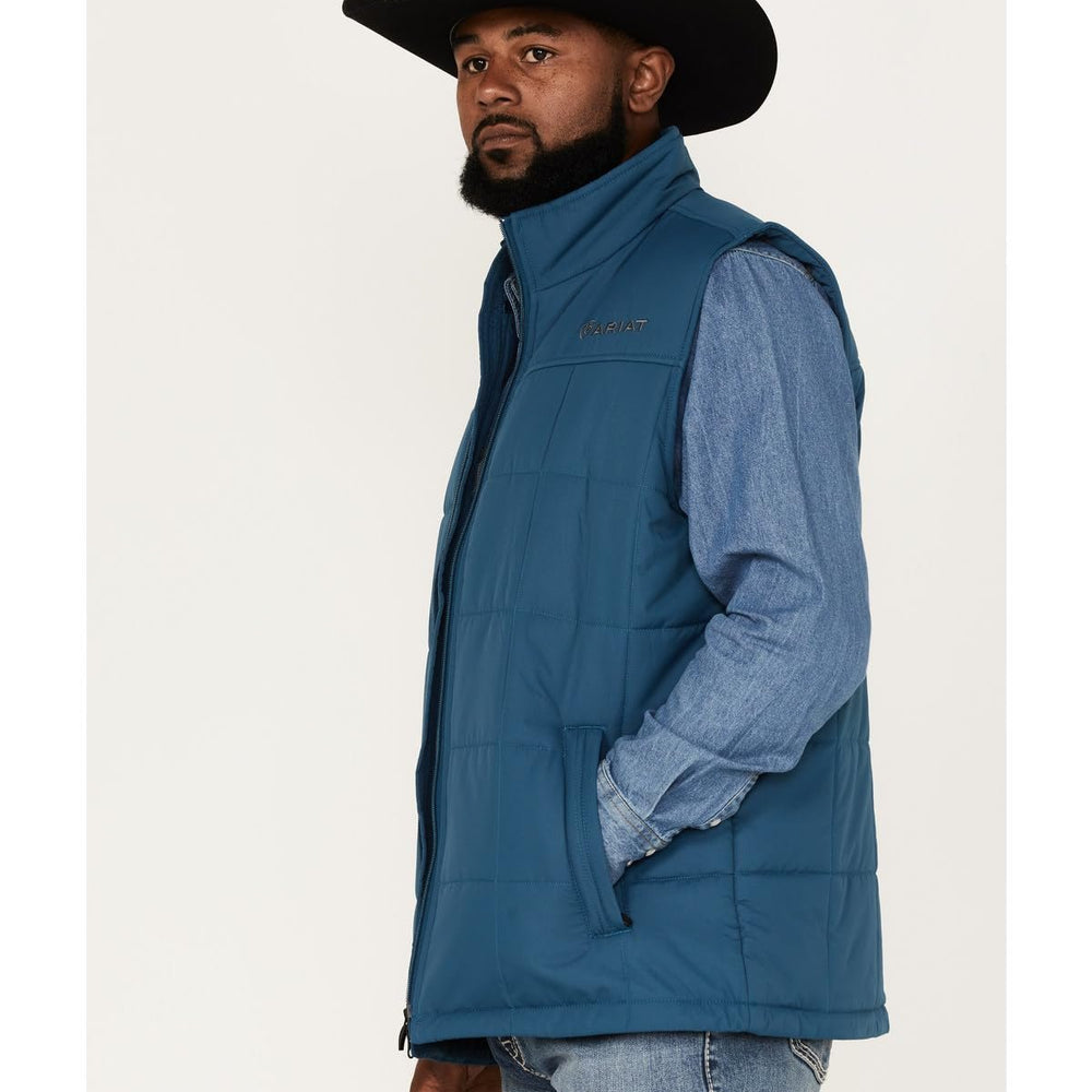 Man Wearing Ariat Men's Crius Insulated Vest in Majolica Blue