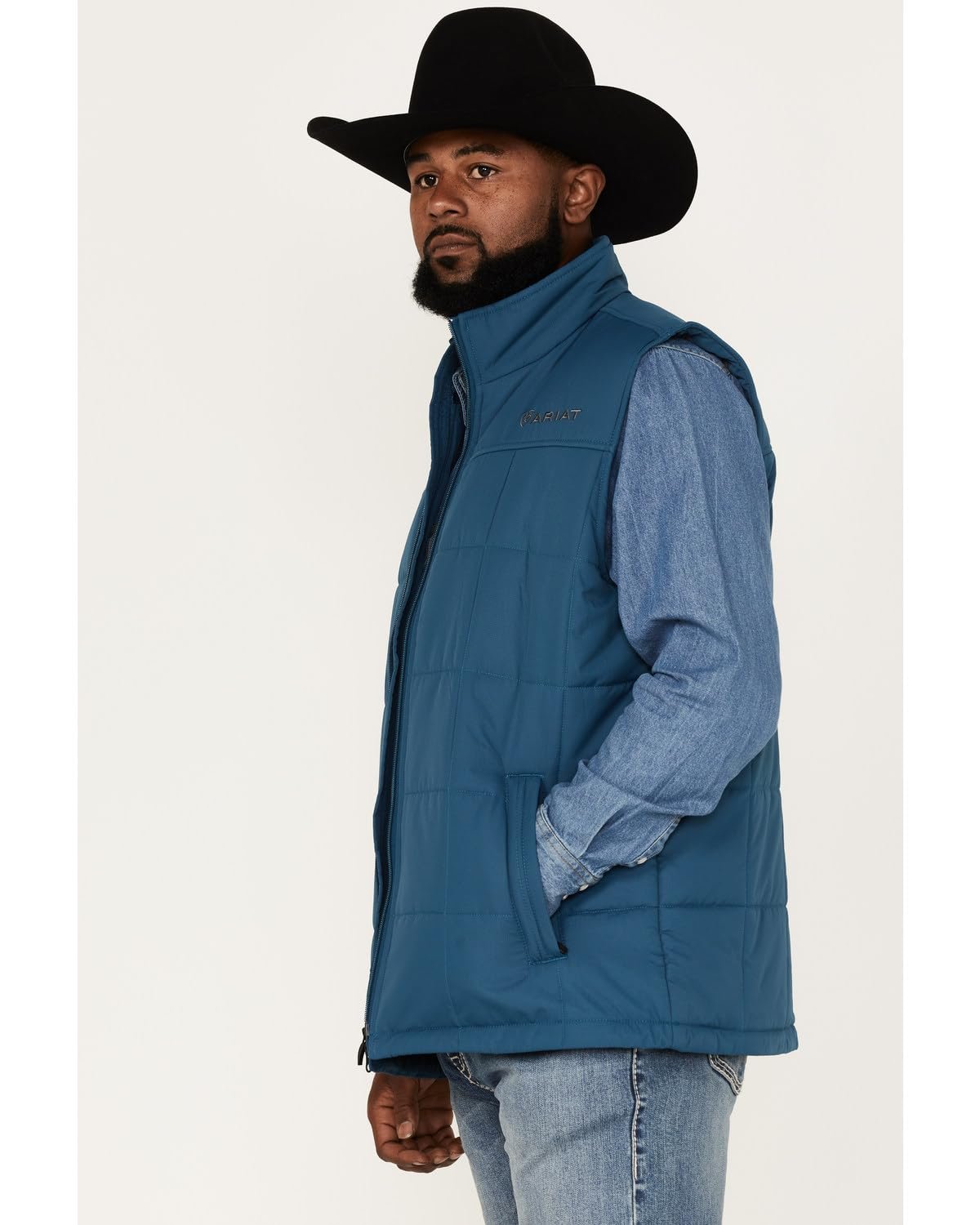 Man Wearing Ariat Men's Crius Insulated Vest in Majolica Blue