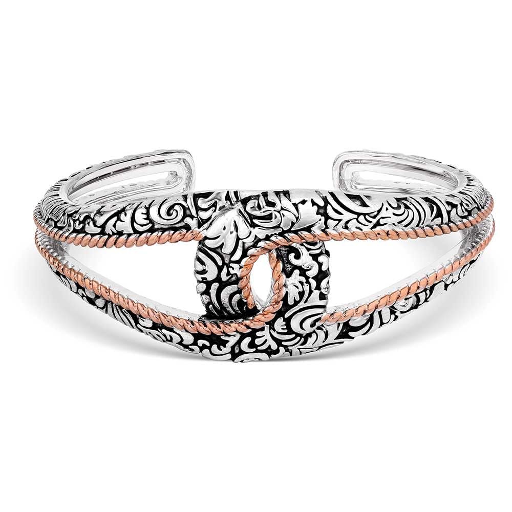 Montana Silversmiths Women's Luck of the Pure Bracelet, with intricate engravings and rose gold rope detailing, featuring an openwork interlocking design
