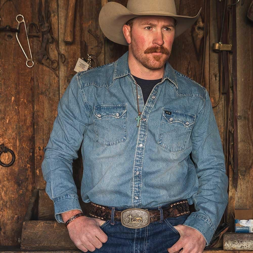 
                  
                    Cowboy Wearing Montana Silversmiths Men's Christian Cowboy Attitude Belt Buckle
                  
                