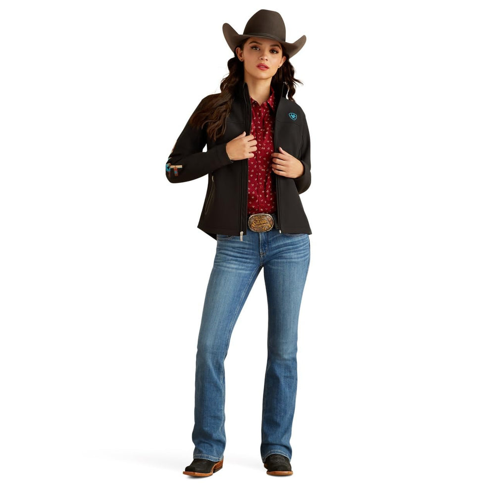 
                  
                    Woman Wearing Ariat Women's New Team Softshell Jacket in Black/Serrano
                  
                