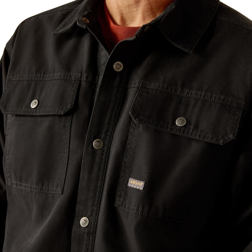 
                  
                    Close-up of the Snap Closure of Ariat Men's Rebar Canvas Shirt Jacket in Black
                  
                