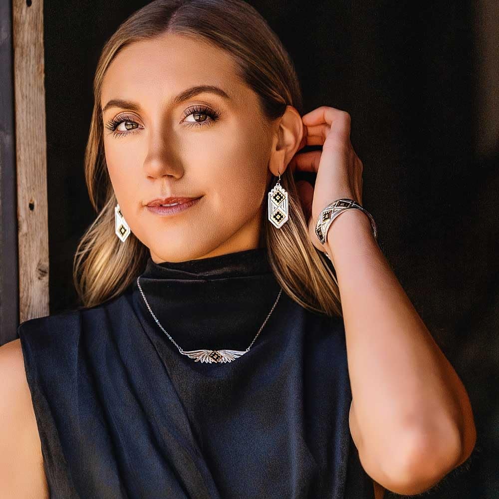 
                  
                    Woman wearing Montana Silversmiths Women's Southwestern Resilience American Made Earrings
                  
                