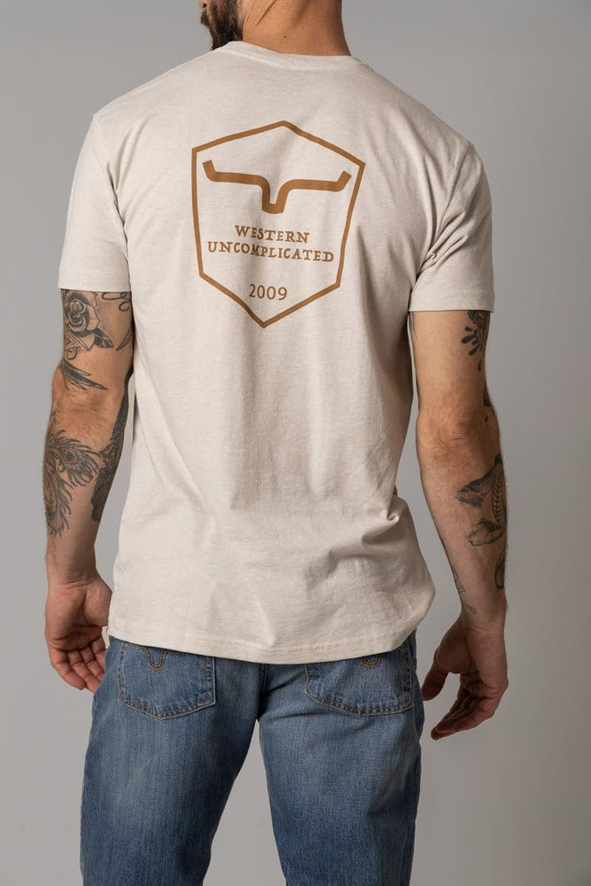 
                  
                    Back of Kimes Ranch Men's Shielded Trucker T-Shirt, Sand
                  
                