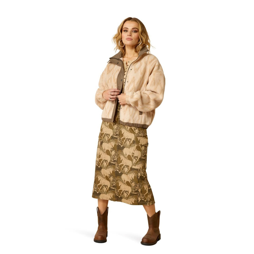 
                  
                    Model Wearing Ariat Women's Sherpa Blocked Jacket in Tonal Sand Print
                  
                
