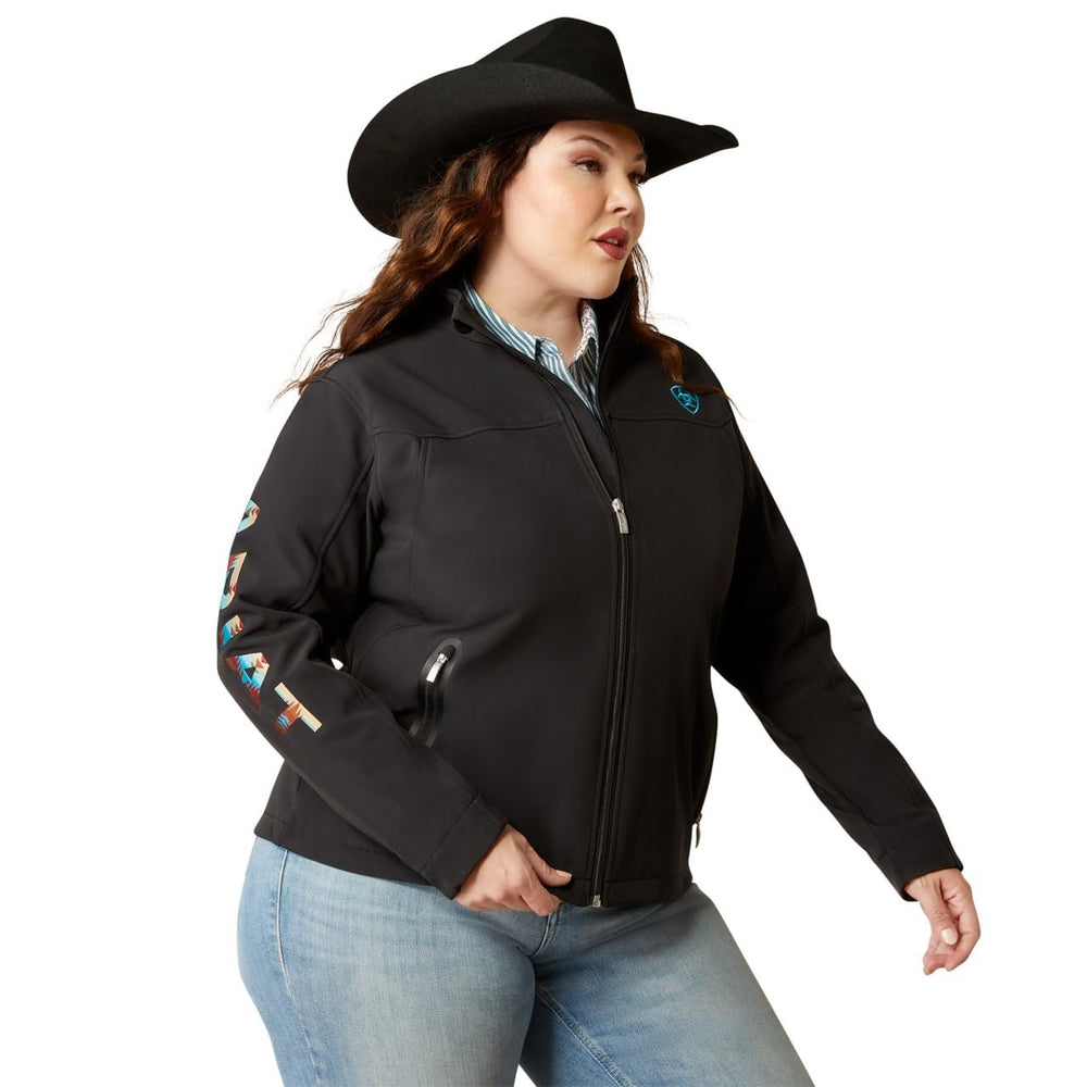 
                  
                    Woman Wearing Ariat Women's New Team Softshell Jacket in Black/Serrano
                  
                