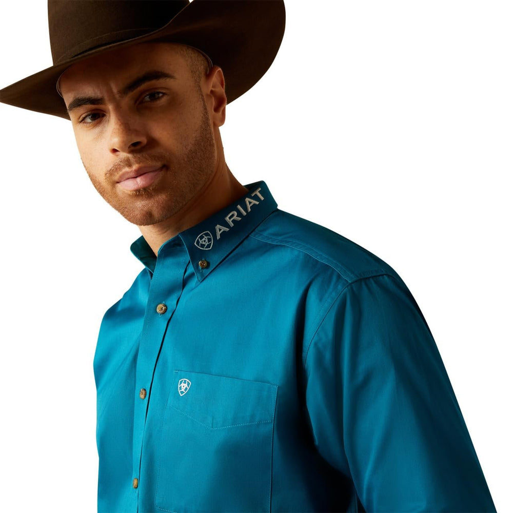 
                  
                    Close-up of Ariat Men's Team Logo Twill Classic Fit Shirt in Dark Teal/White
                  
                