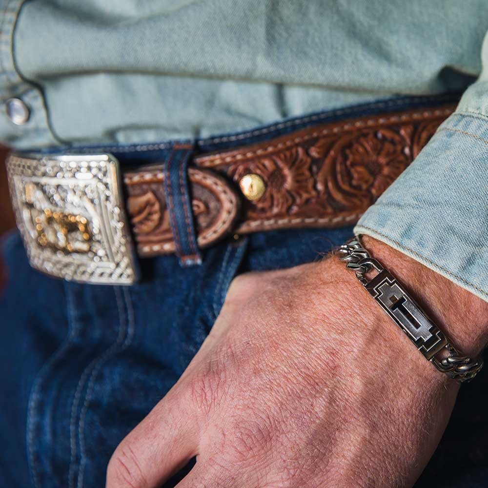 Man Wearing Montana Silversmiths Men's Devoted Faith Cross Cuban Link Bracelet