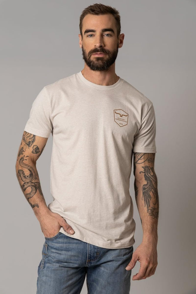 
                  
                    Man wearing Kimes Ranch Men's Shielded Trucker T-Shirt, Sand
                  
                