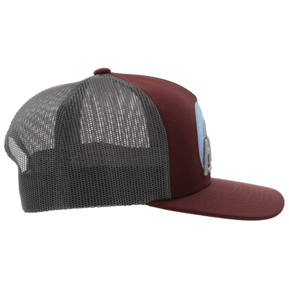 
                  
                    Maroon and gray mesh trucker cap on a white background
                  
                