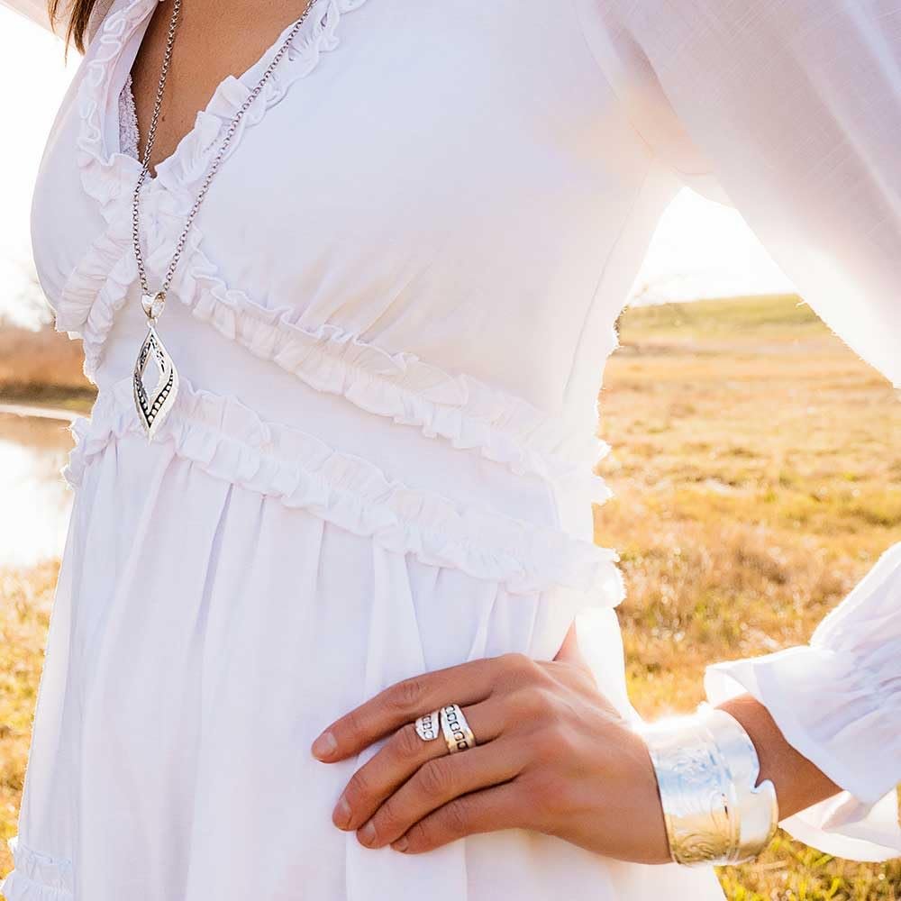 
                  
                    Woman Wearing Montana Silversmiths American Made Spirit Wrap Ring
                  
                